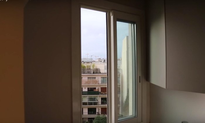A Homemade Periscope Allows This Man To See The Eiffel Tower From His Bed