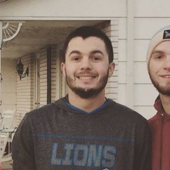 College Student Poses For Christmas Card With Fake Family To Troll His Relatives