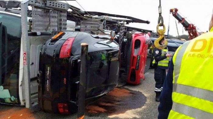 Transporter Carrying 9 Supercars Overturns On The Road