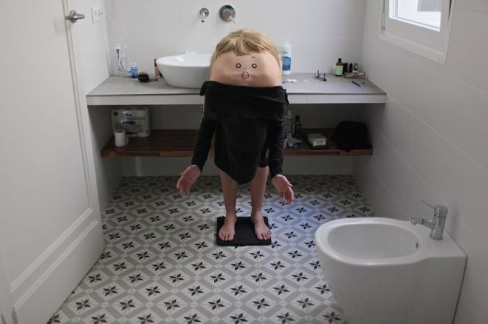 An Artist Is Turning People Into Strange Creatures By Drawing Faces On Their Backs