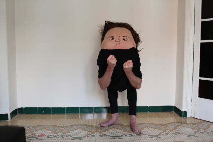 An Artist Is Turning People Into Strange Creatures By Drawing Faces On Their Backs