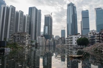 This Chinese Village Sits In The Shadows Of Tall Skyscrapers