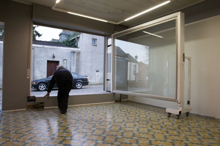 Belgian Man Builds A Secret Garage Door