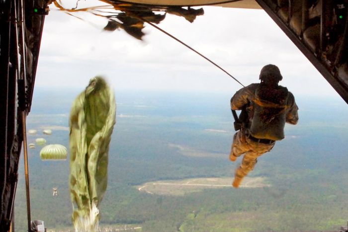 US Marines Jump Out Of A Plane And Into Action