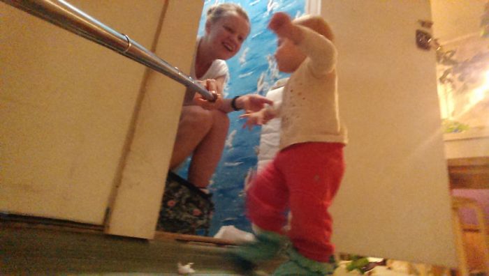 Woman Uses A Selfie Stick To Document A Day In The Life Of A Mom
