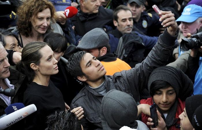 Angelina Jolie Meets With Hundreds Of Star Struck Immigrants In Greece