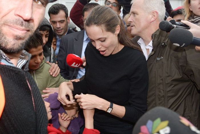 Angelina Jolie Meets With Hundreds Of Star Struck Immigrants In Greece
