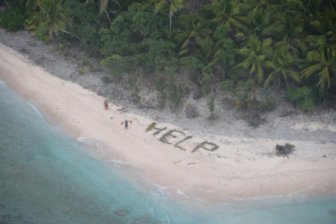 Castaways Get Rescued After Making A Help Sign In The Sand