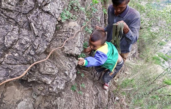 Children From This Remote Chinese Village Travel Unsafe Terrain To Get To Class
