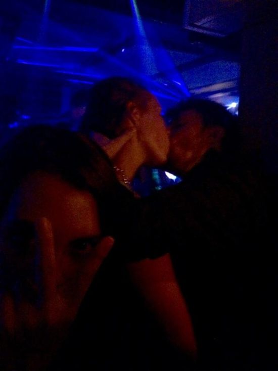 Girl Takes Selfies With Random Couples While They're Making Out