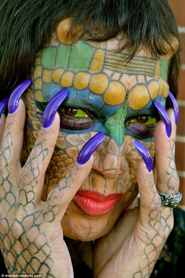 Former Bank Employee Modifies Their Body To Look More Like A Dragon
