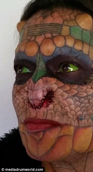 Former Bank Employee Modifies Their Body To Look More Like A Dragon