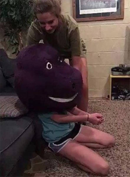 Young Girl Gets Stuck In A Barney The Purple Dinosaur Costume