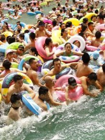 Thousands Of Tourists Gather In China's Largest Indoor Swimming Pool