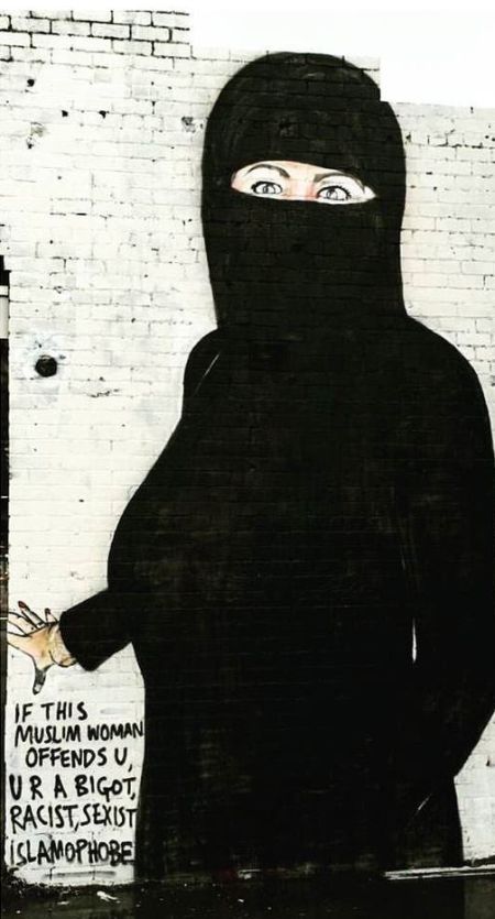 Nearly Naked Hillary Clinton Graffiti Gets Turned Into A Muslim Woman