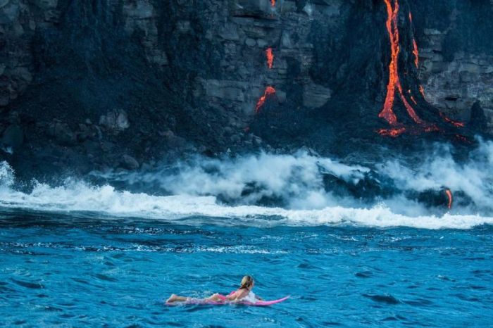 Adventurous Surfer Swims Near Erupting Volcano In Hawaii