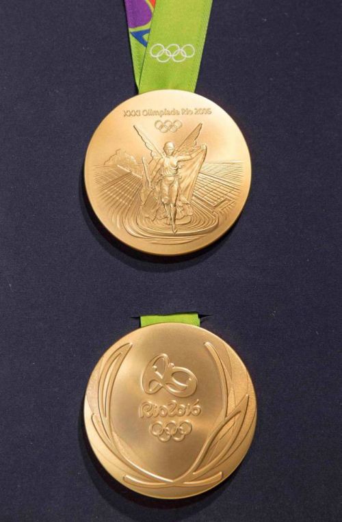 A Look Back At How Olympic Gold Medal Designs Have Changed Over The Years