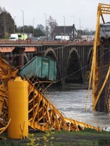 Chemical Train Plunges Into River After Bridge Collapses