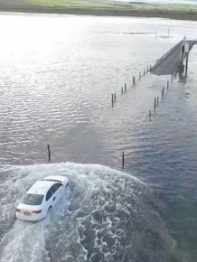 Drone Captures Uber Driver Racing Against The Sea Tide