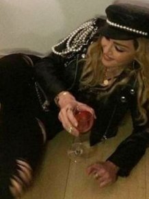 Madonna Drinks Wine On The Floor During Photography Exhibit