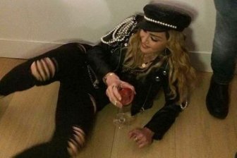 Madonna Drinks Wine On The Floor During Photography Exhibit