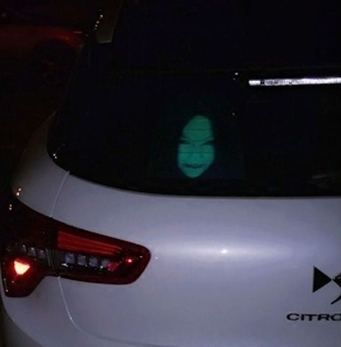 Drivers Are Using Terrifying Decals To Fight Against High-Beam Users