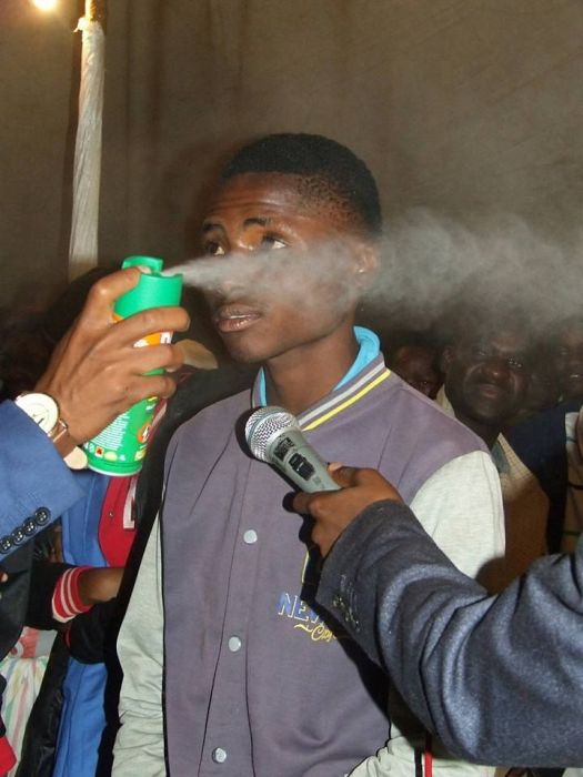 A South African Pastor Is Spraying People With Pesticide