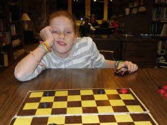 Guy Documents His Cousin's Defeat In Their Thanksgiving Checkers Challenge