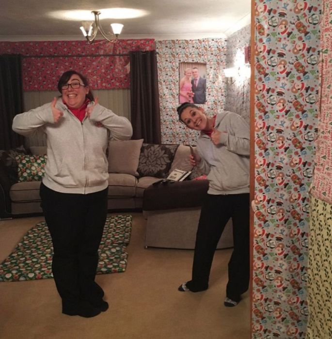Family Transforms Happy Couple's Home Into A Giant Christmas Gift