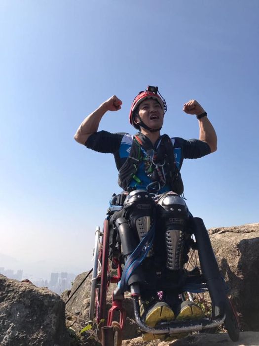 Strong Man In A Wheelchair Climbs A Mountain In China