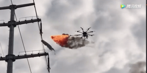 Power Company Uses Drone To Burn Trash Off High Voltage Wires