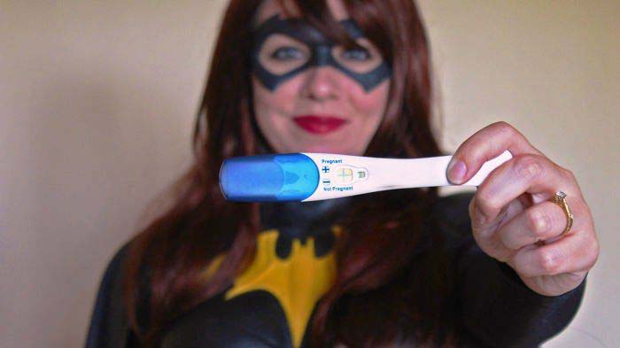 Couple Uses Superhero Costumes To Make Hilarious Pregnancy Announcement
