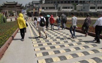 Chinese Tourist Attraction Adds Ridiculous Speed Bumps For Pedestrians