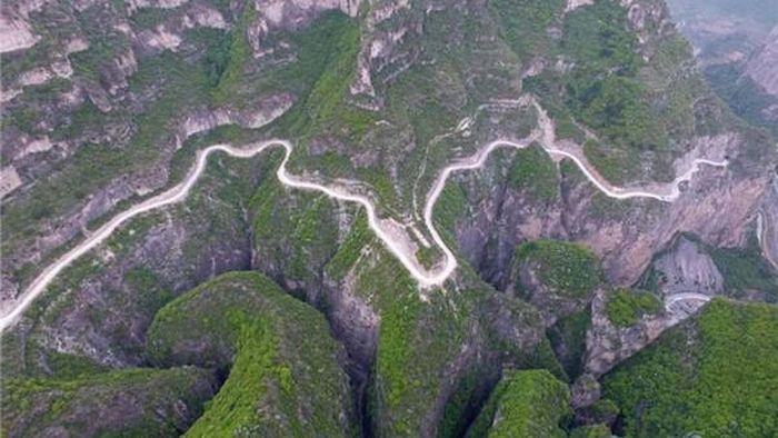 Global Travelers Are Astonished By China's Hand Chiseled Hanging Highway