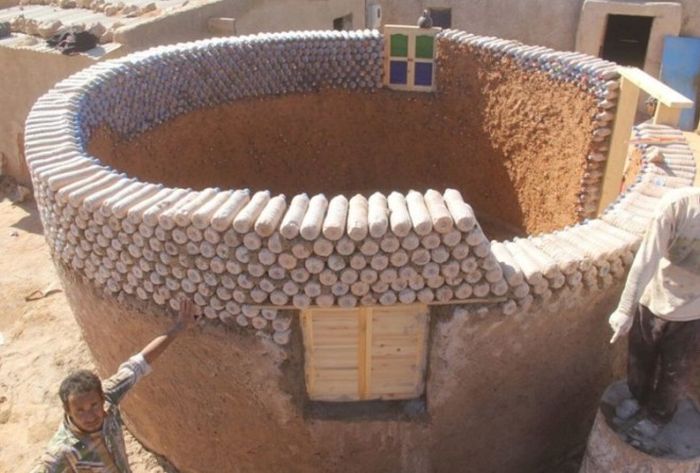 Guy Builds Houses Out Of Plastic Bottles In Algeria
