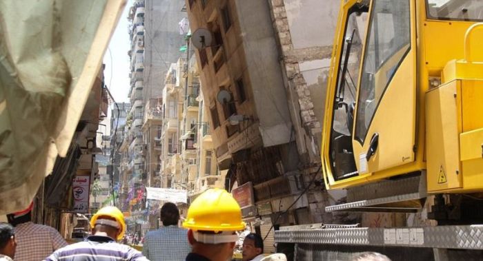 High Rise Building Falls Into A House In Egypt