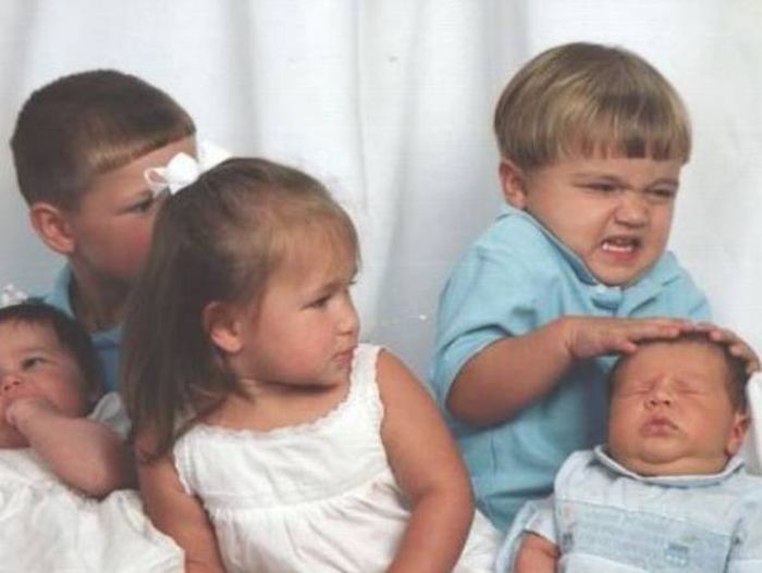Kids Who Clearly Don't Care About Your Stupid Family Photos