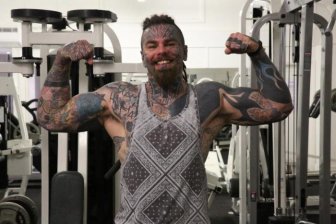 Bodybuilder Covers Up His Tattoos With Fake Tan