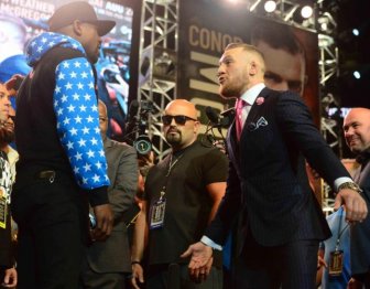 Conor McGregor Taunts Floyd Mayweather With Custom Suit