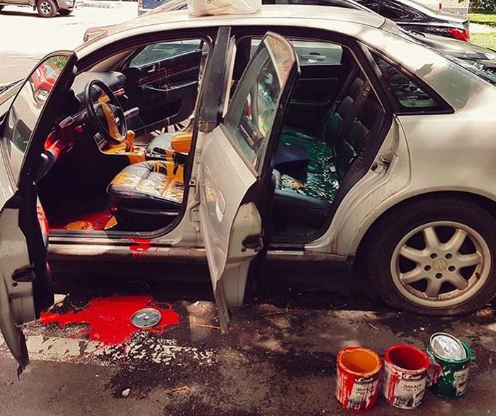 Car Destroyed By Paint Cans In Moscow