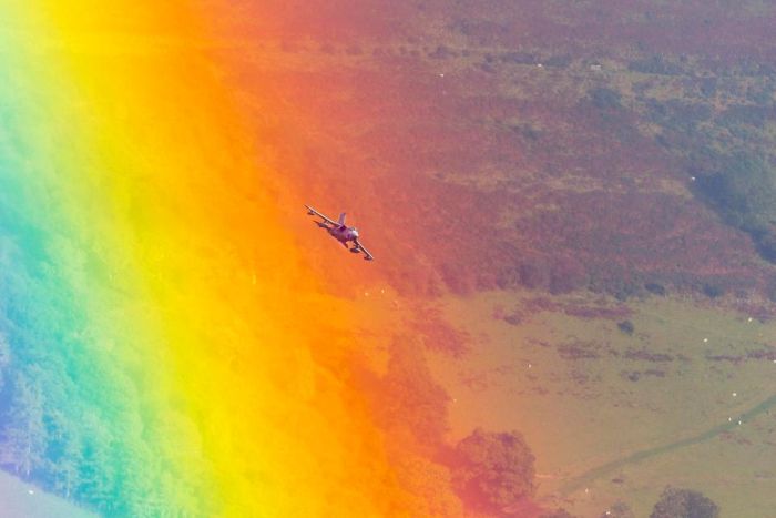 Incredible Photo Captures Jet Flying Through A Rainbow