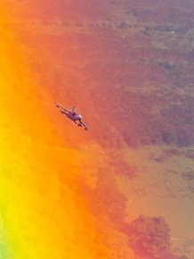 Incredible Photo Captures Jet Flying Through A Rainbow