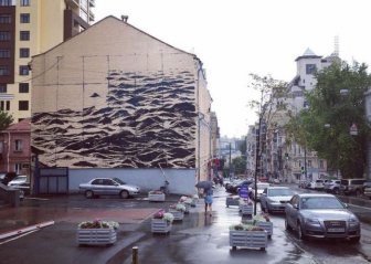 Ferocious Black Sea Covers The Wall Of A Three Story Building