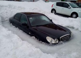 Car Stuck In Ice In Russia