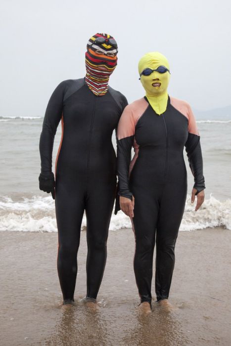 Chinese Use These Swimsuits To Keep Their Skin White