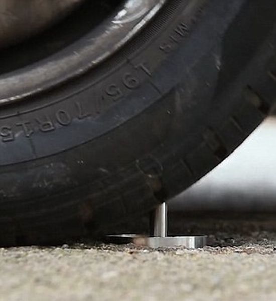 CatClaw Gives Cars Flat Tyres By Puncturing Them With A Sharp Steel Spike