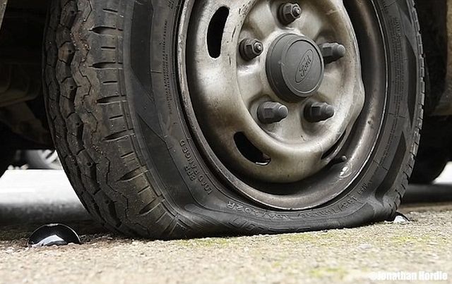 CatClaw Gives Cars Flat Tyres By Puncturing Them With A Sharp Steel Spike