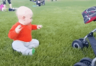 Babies And Grass Is A Funny Combination