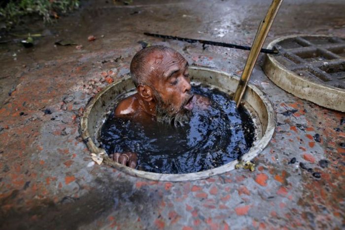 What A Job. This Guy Cleans Sewage In Bangladesh