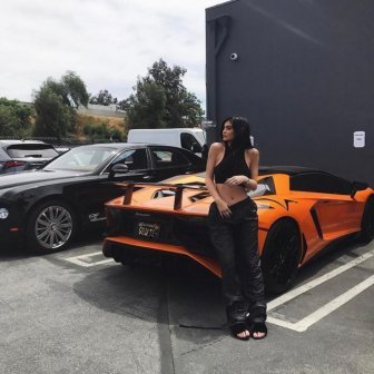 Outfits Of The Kardashians Suits Their Cars